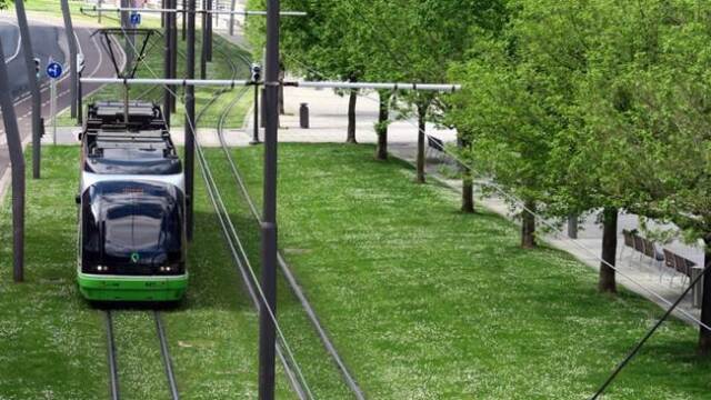 The lawned R-o-W gives the tramway a park like atmosphere, yet retaining an almost metro like operation.